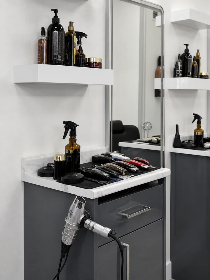 Polished Bladez Affair barber station with clippers, products and chrome dryer