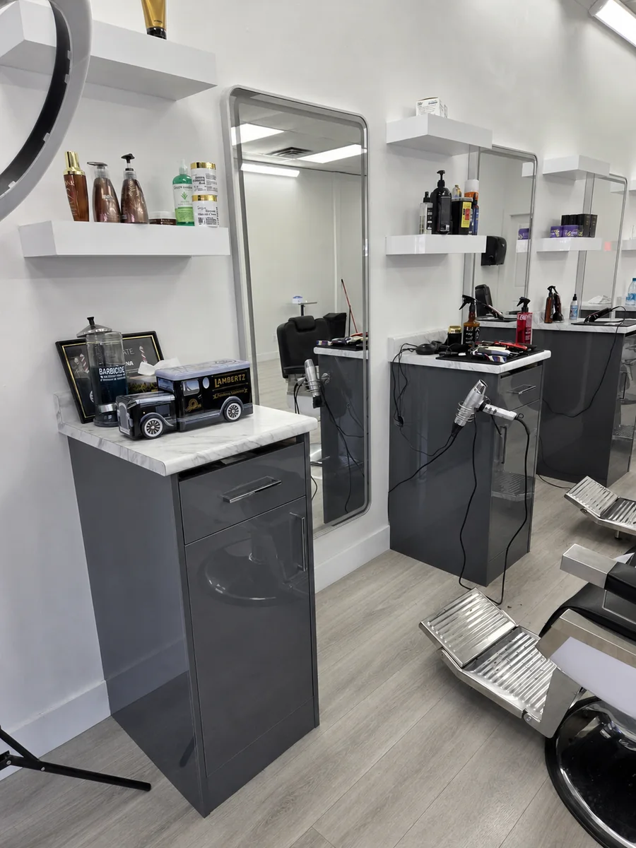 Bladez Affair grooming station with mirror, tools and product shelves